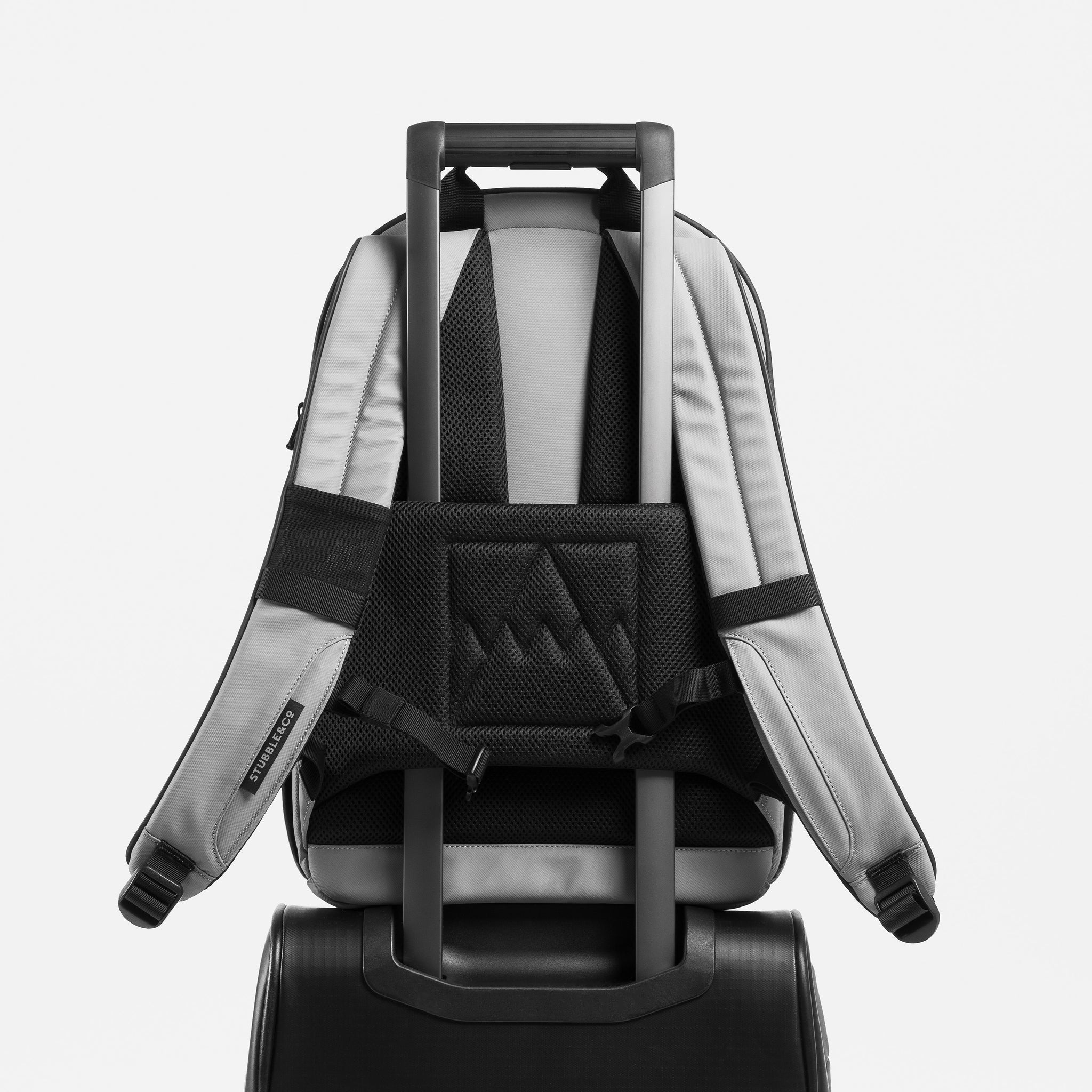 A studio shot of the trolley sleeve on the Everyday Backpack 20L in Concrete
