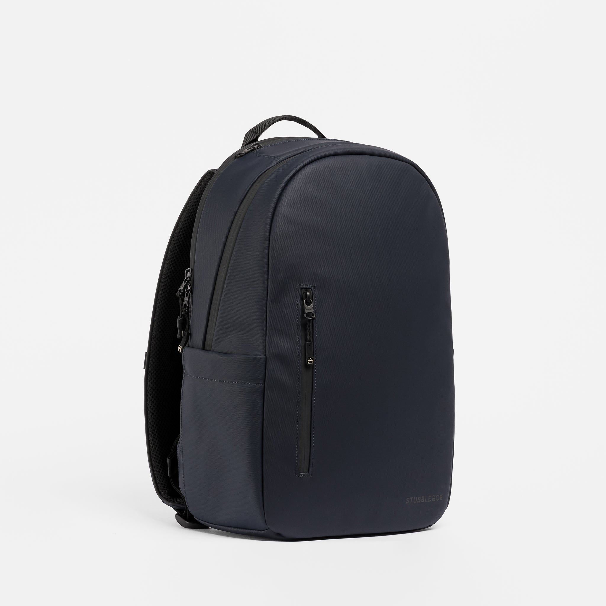 A studio shot of an Everyday Backpack 15L in Midnight Blue showing the front and side of the bag