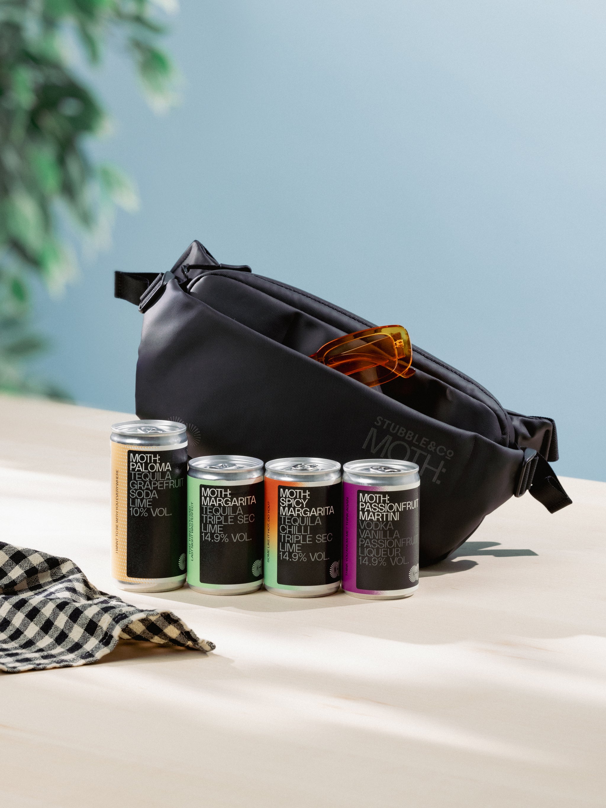 A studio shot of the MOTH co-branded crossbody