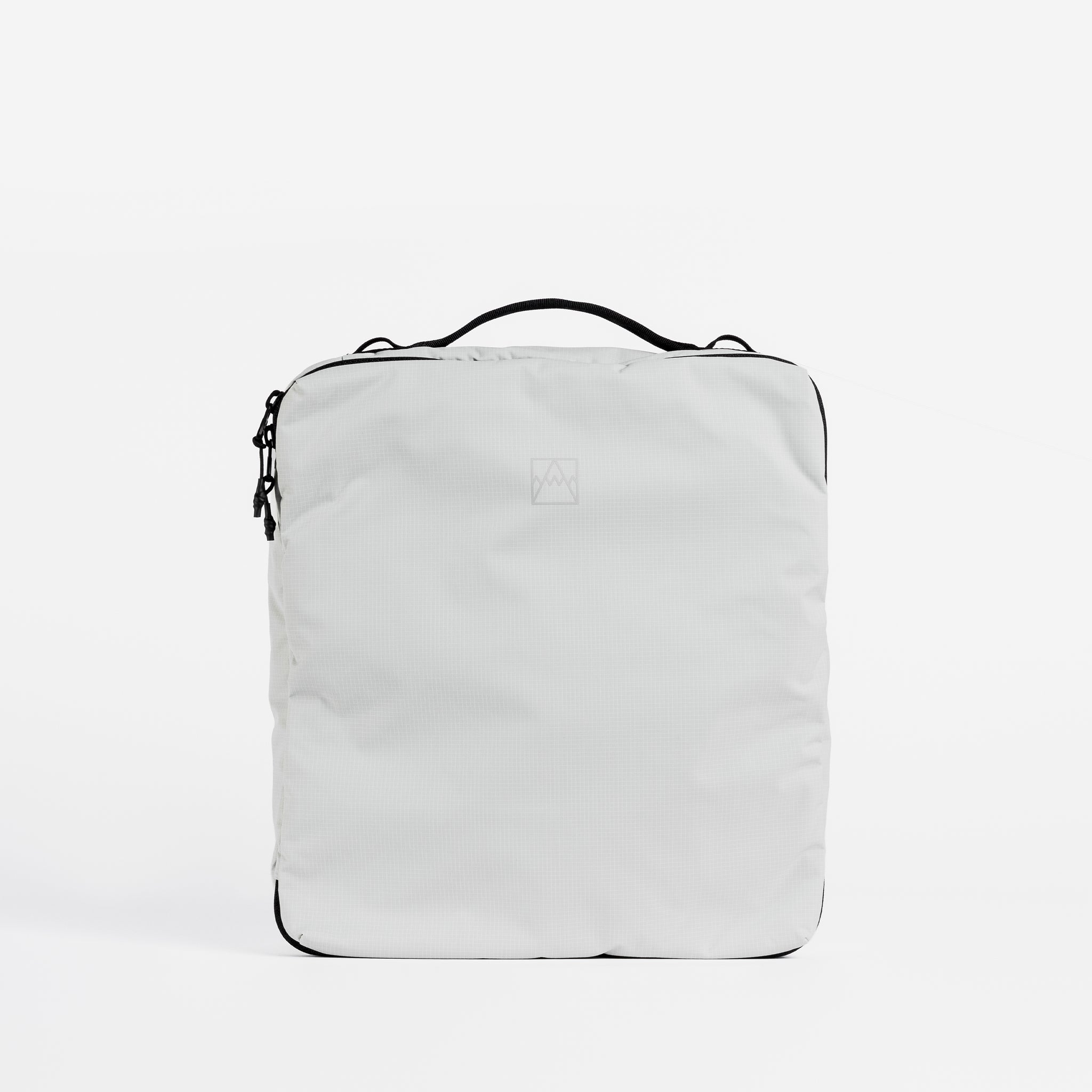 The packing cube 11L in Off-White