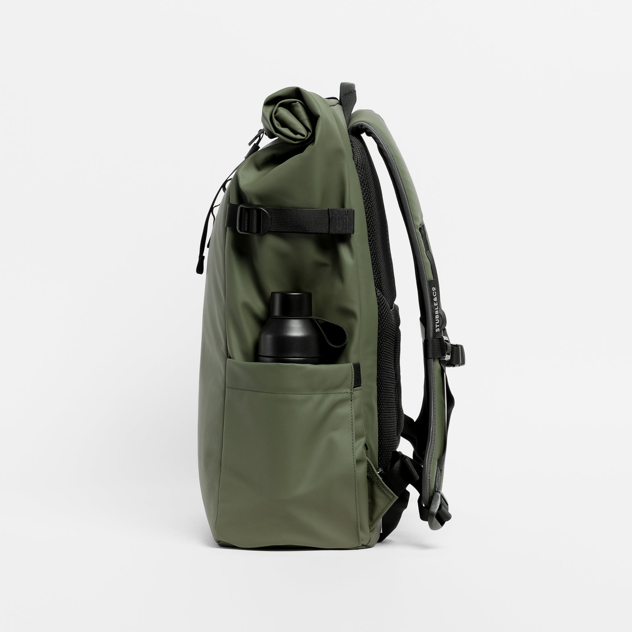 A  studio shot of the Roll Top 30l in Urban Green showing the side bottle pocket