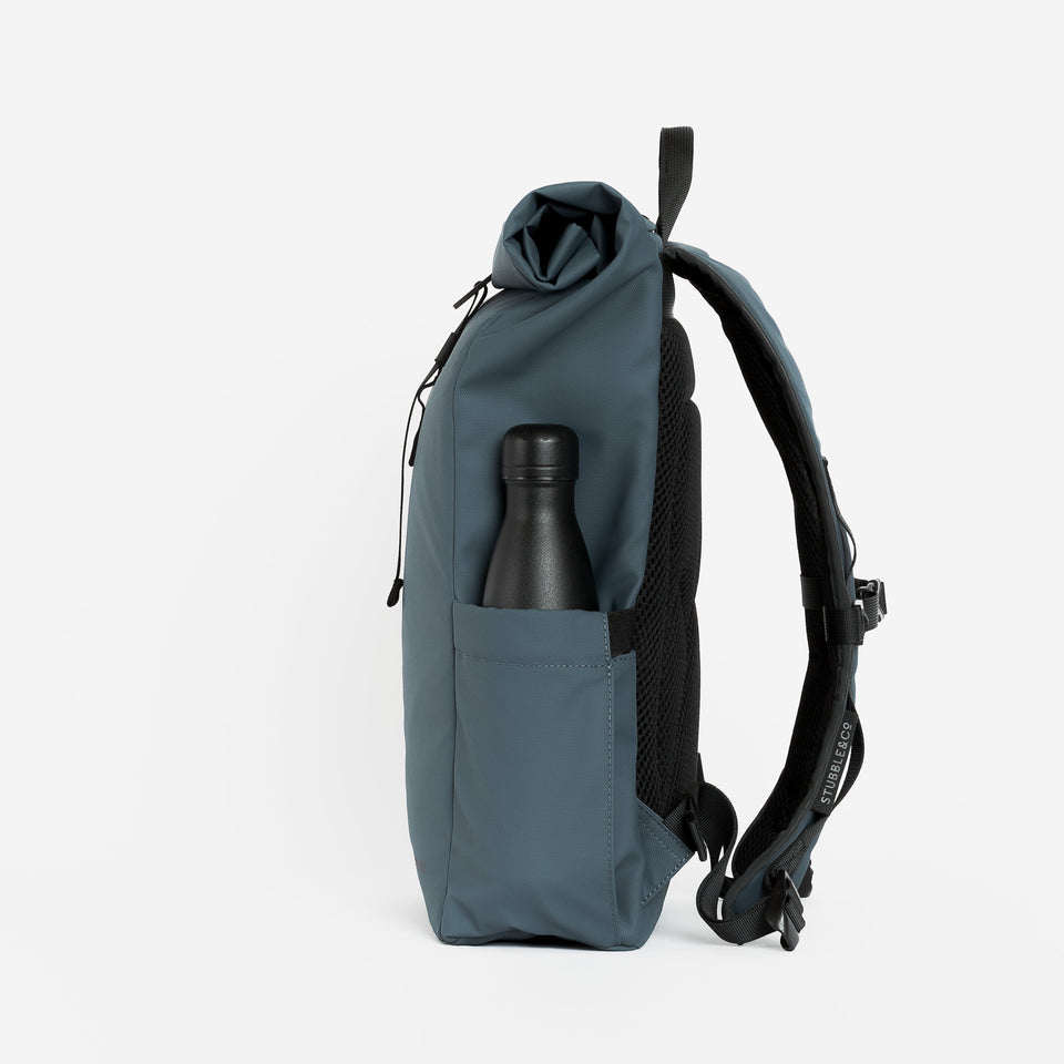 Roll Top Mini backpack with side bottle pockets