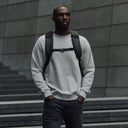 Man with All Black Everyday Backpack