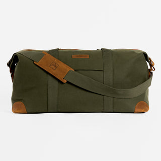 Product shot of The Weekender in All Black from the front, with the shoulder strap in front.