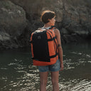 Women wearing Adventure Bag in Ember Orange