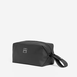 The Wash Bag in All Black at a side angle