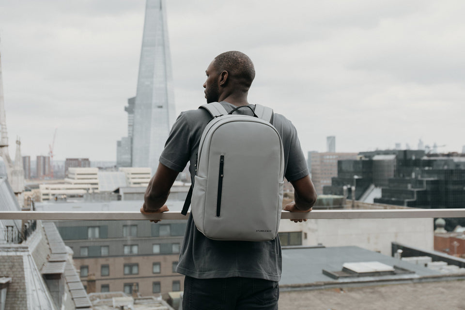 Man with grey Everyday Backpack