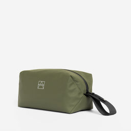The Wash Bag in Urban Green at a side angle