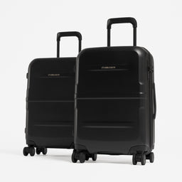 Two black hard-shell spinner suitcases, one large and one small. [All variants]