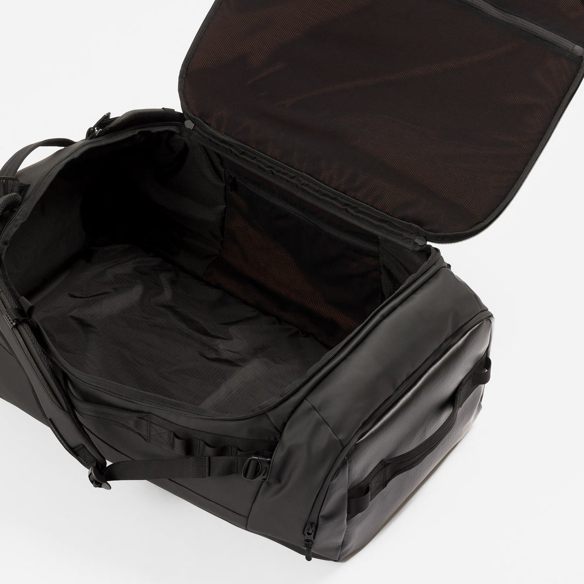 All Black duffel bag shown open, displaying its spacious interior and exterior design against a clean white background.