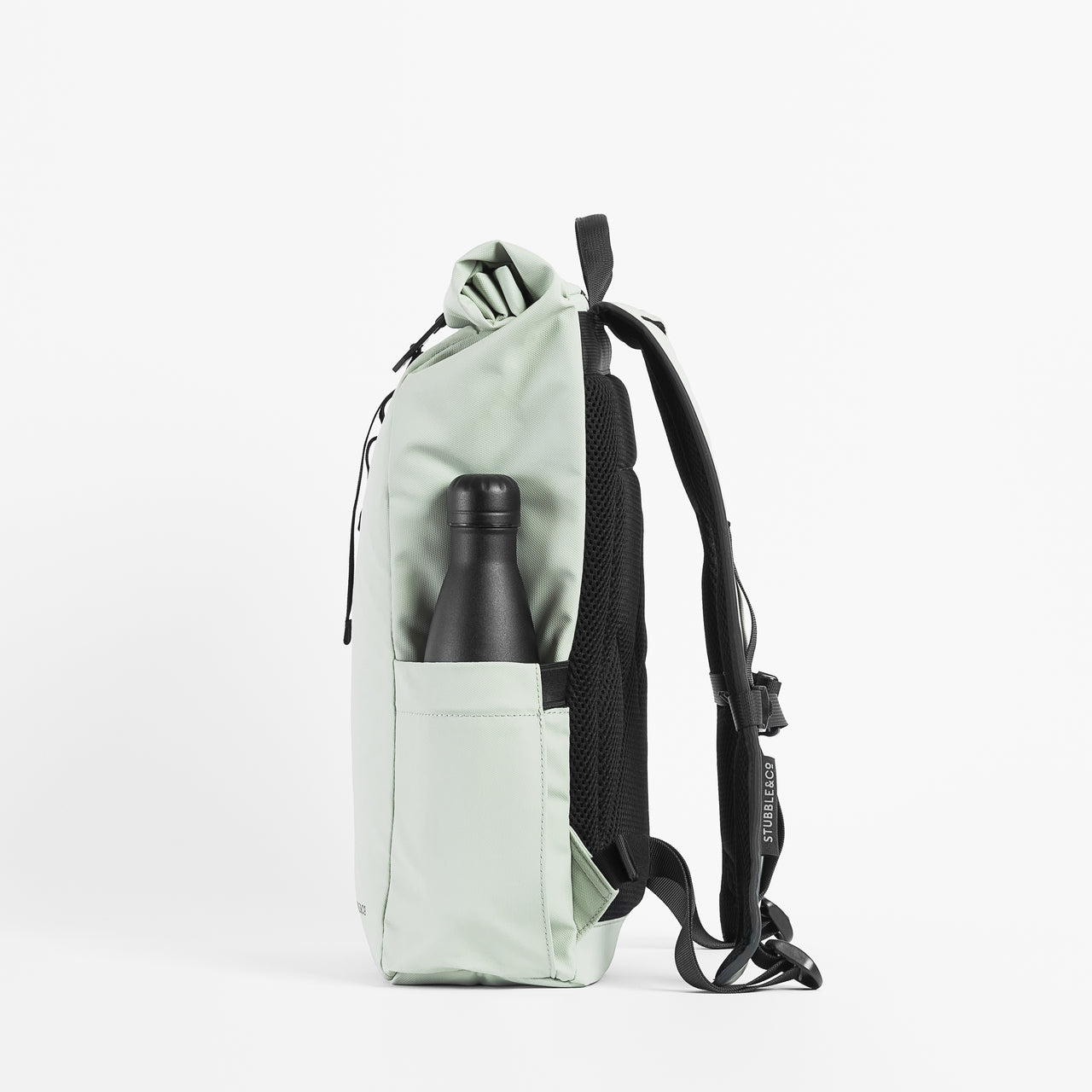 Side view of the Roll Top Mini Backpack in Matcha green