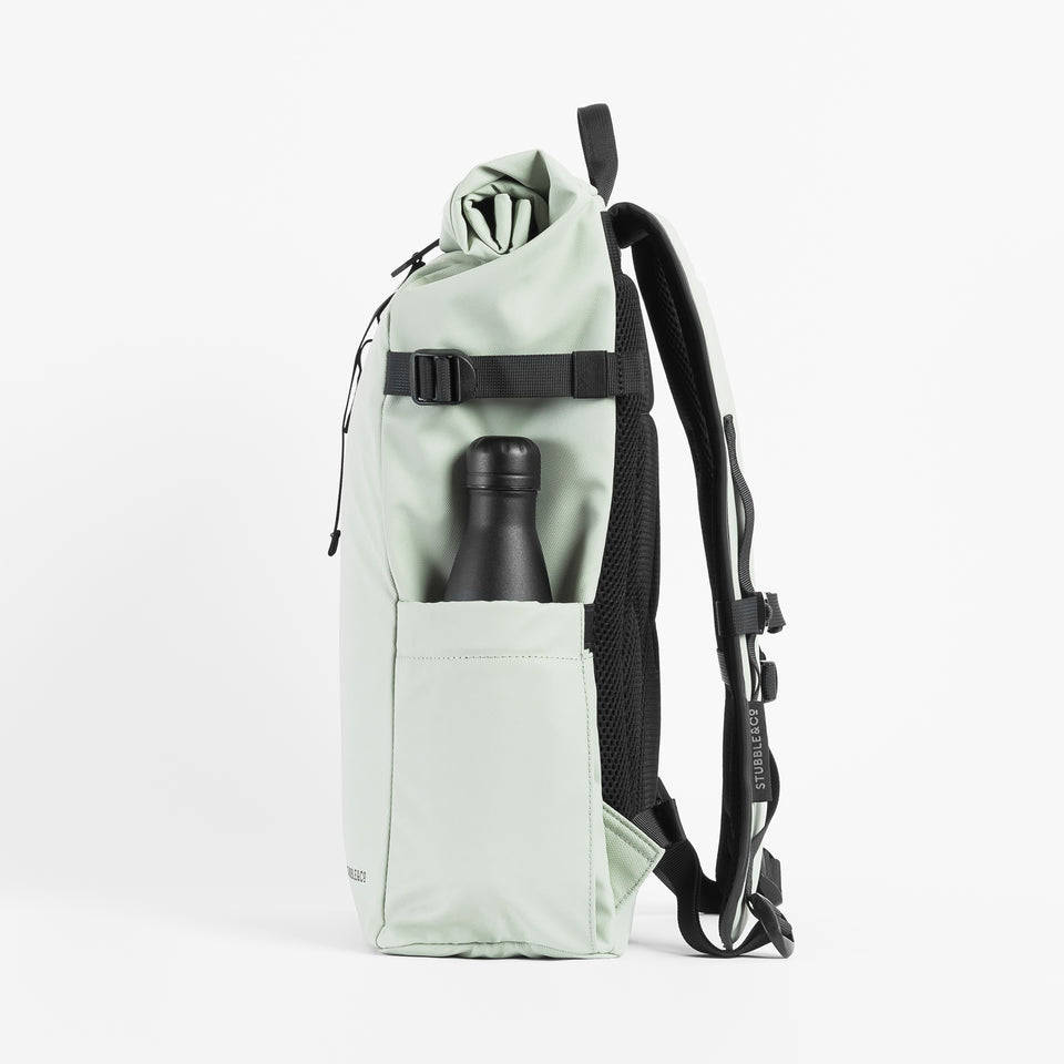 Side view of the Roll Top Backpack in Matcha green