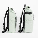 Side by side view of the Roll Top and Roll Top Mini Backpacks in Matcha green