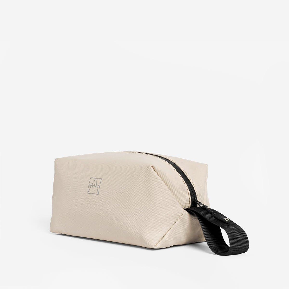 The Wash Bag in Sand at a side angle