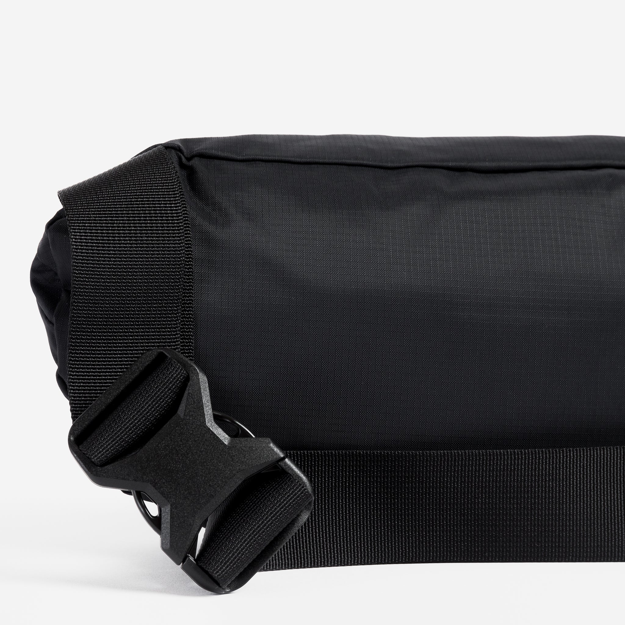 A studio shot of the back and clip on the ultra light sling [All variants]