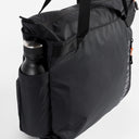 a studio shot of the bottle pocket of a black ultra light tote bag [All variants]