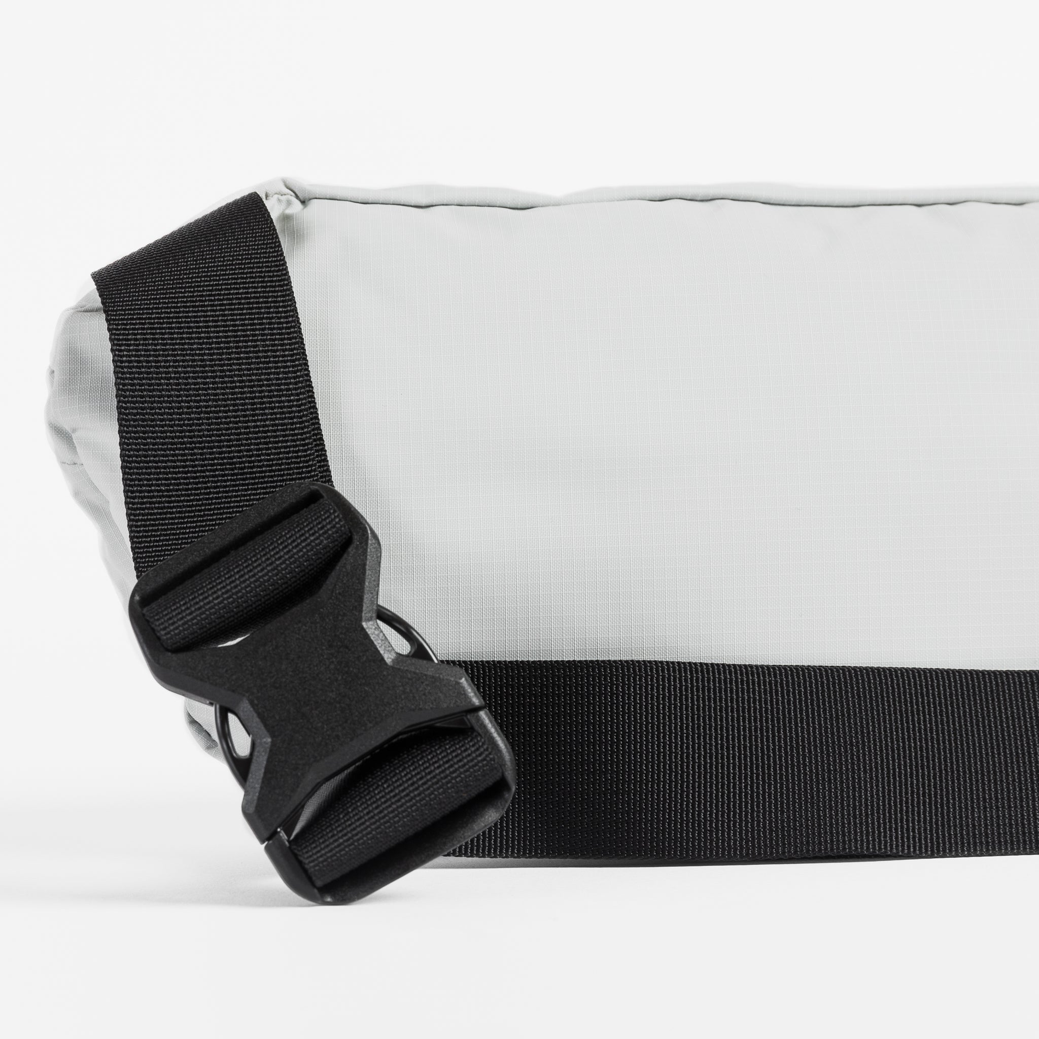 Back close up view of the Off White packable Ultra Light Crossbody Bag