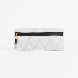 Front view of the Off White packable Ultra Light Crossbody Bag packed into it's pocket