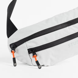 Close up of the Off White packable Ultra Light Crossbody Bag