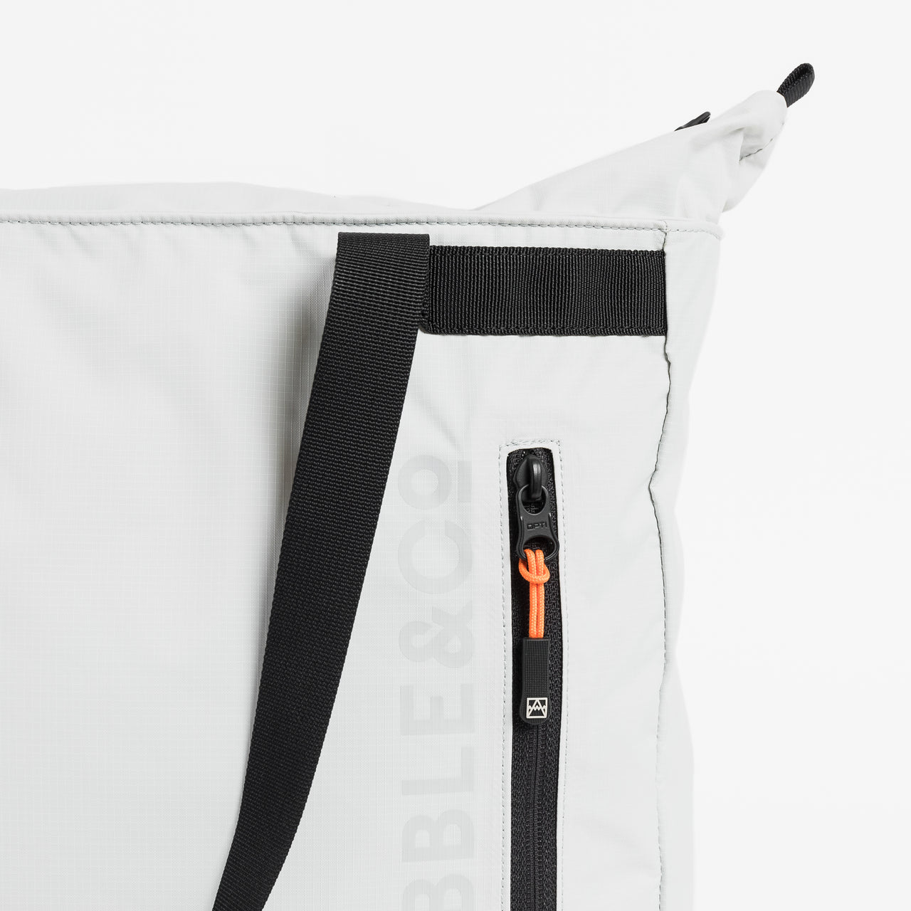 Close up view of Off White packable Ultra Light Tote Bag