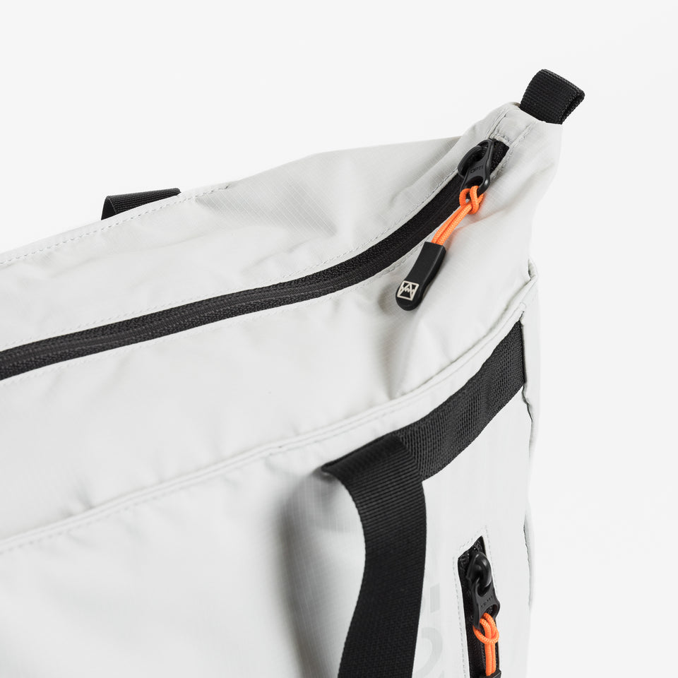 Close up view of Off White packable Ultra Light Tote Bag