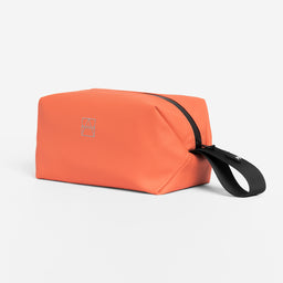 Recycled Plastic Wash Bag in Ember Orange angle view