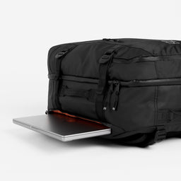 Adventure Bag in All Black top view with laptop pocket