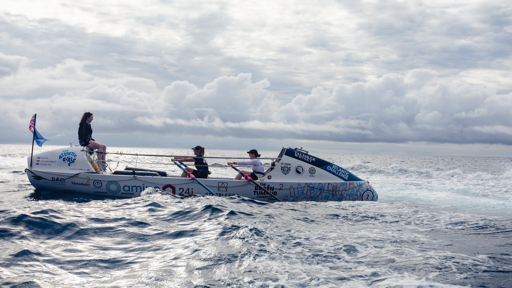 Three woman rowing on across the Atlantic Ocean