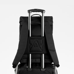 A studio shot of the luggage sleeve on the Backpack 20L in All Black