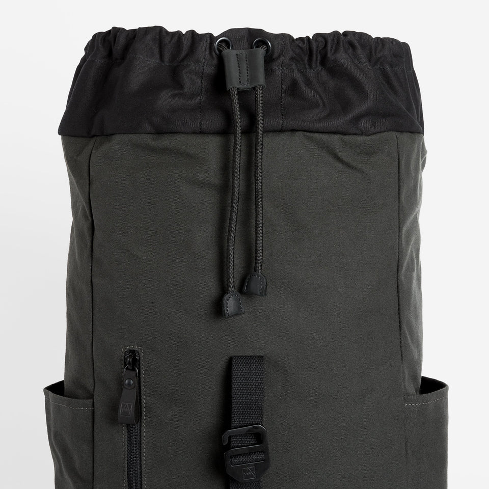 Backpack in grey with drawstring top