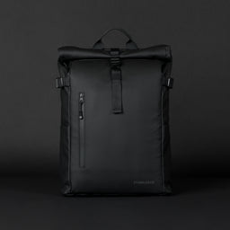 The Roll Top 20L backpack in All Black on a dark studio background