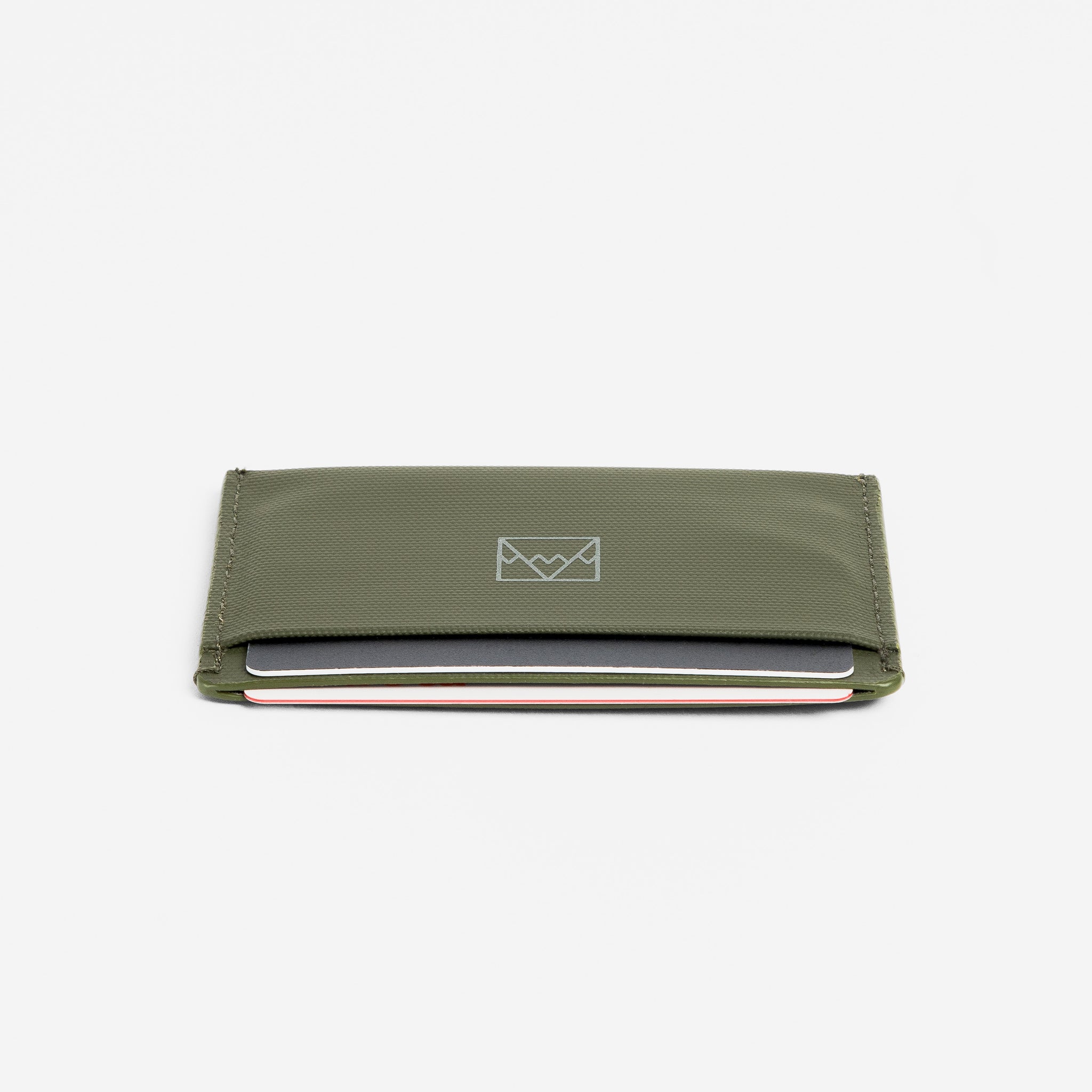 A studio shot of the end of the Card Holder in Urban Green