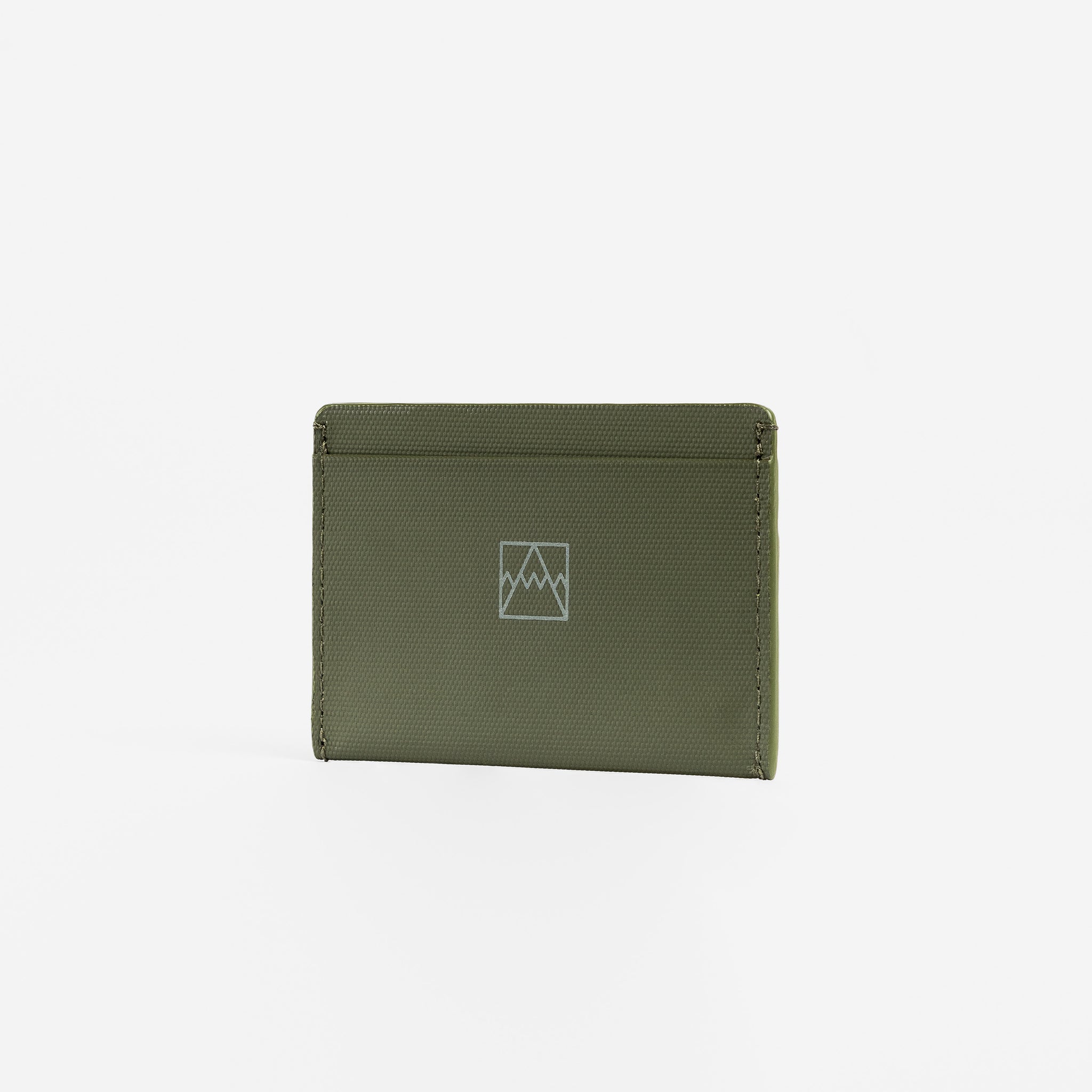 A studio shot of the front of the Card Holder in Urban Green