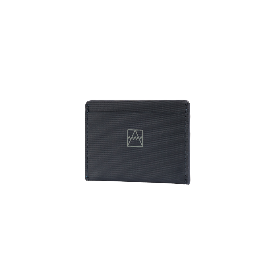 A studio shot of the front and side of an card holder  as cut out transparent PNG- midnight