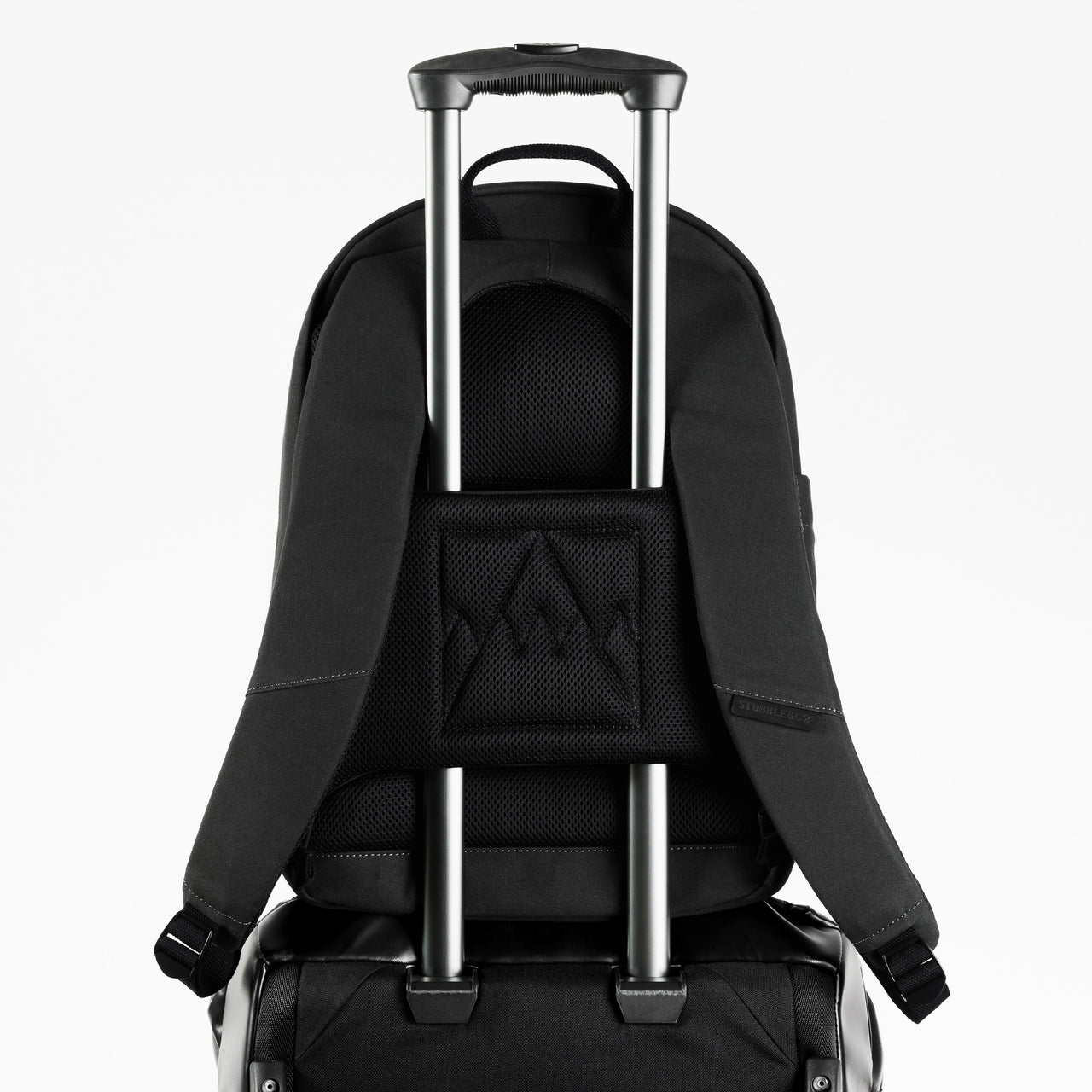 A studio shot of the luggage sleeve on the Classic Backpack 15L in All Black