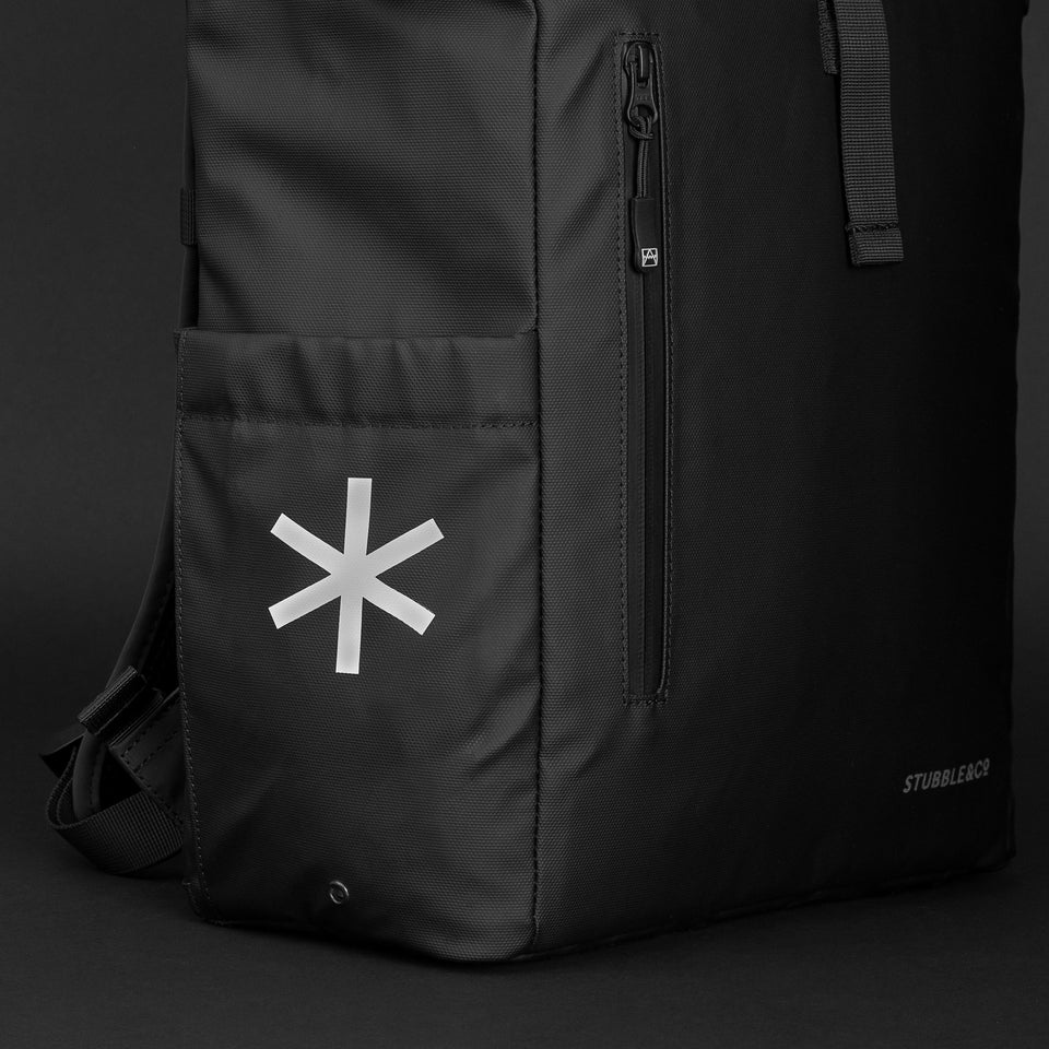 close up on black bag with a star logo