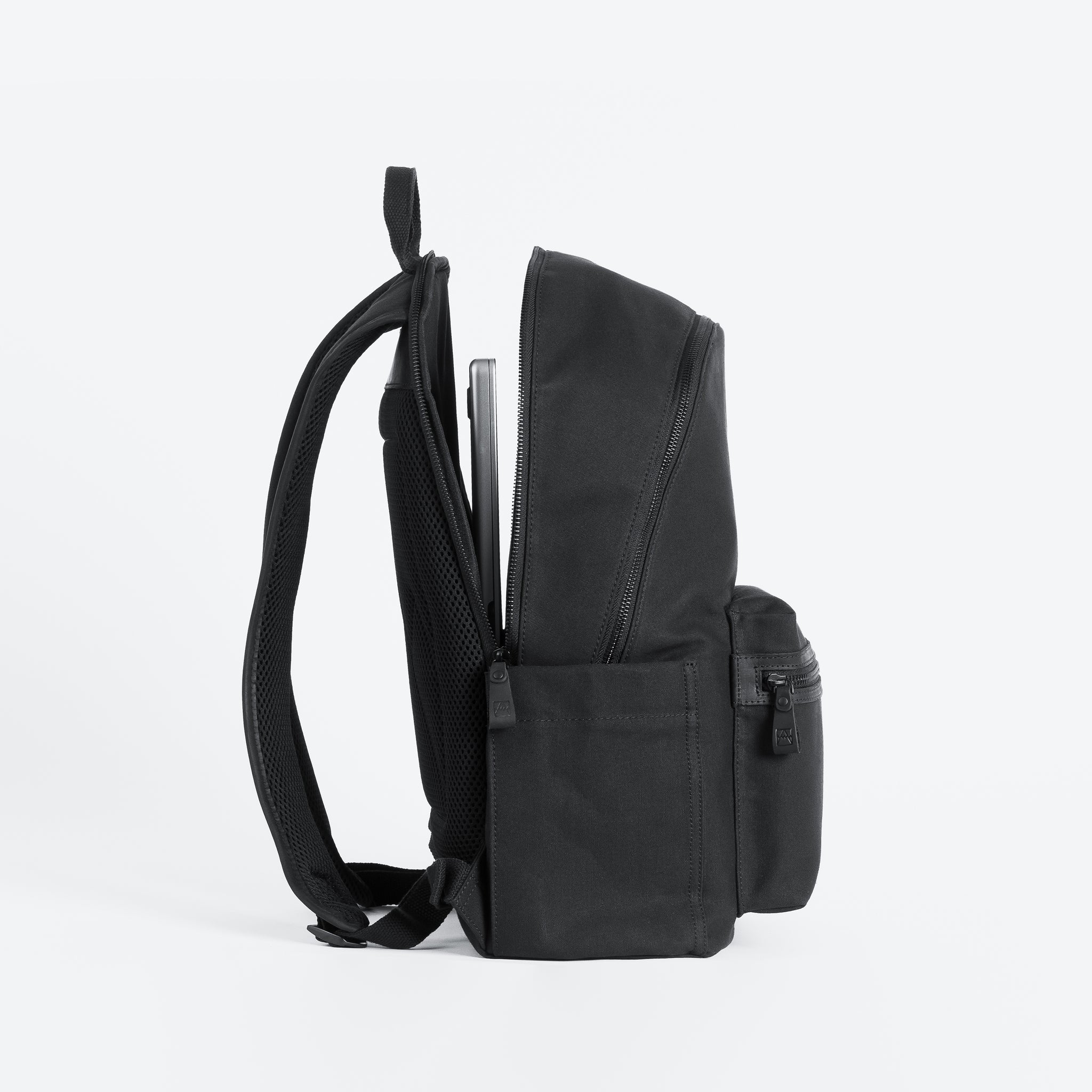 The Commuter All Black side view with laptop compartment