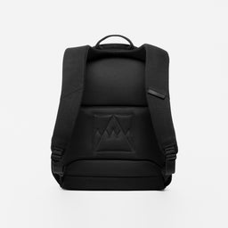 A studio shot of the back panel and trolley sleeve on the Commuter Backpack 25L in All Black