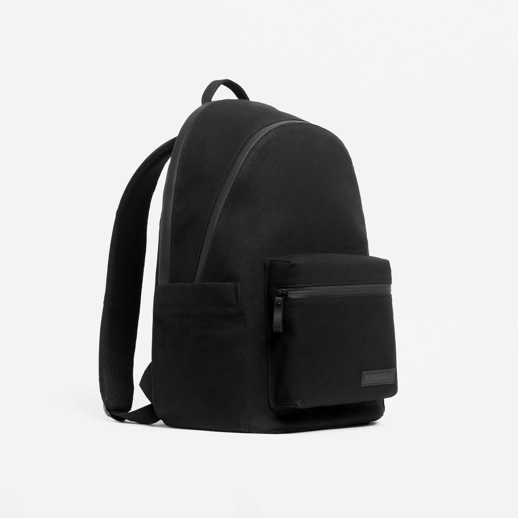 A studio shot of the All Black Commuter Backpack 25L at a side angle
