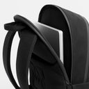 A studio shot of the laptop pocket on the Commuter Backpack 25L in All Black