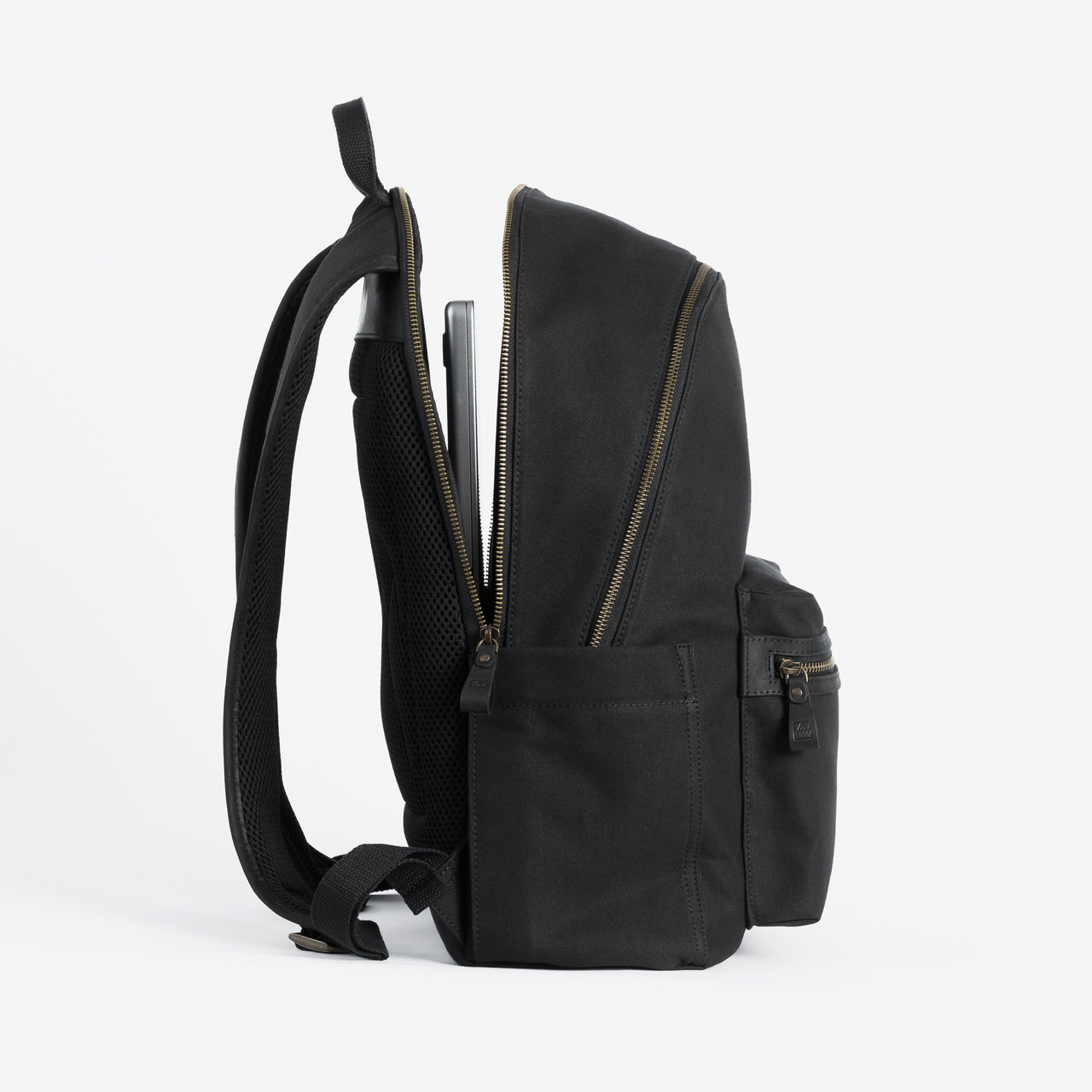 The Commuter Backpack in Black and Gold open