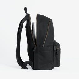 The Commuter Backpack in Black and Gold open