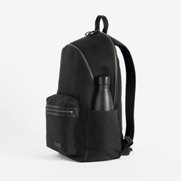 The Commuter Backpack in Black and Gold side angle
