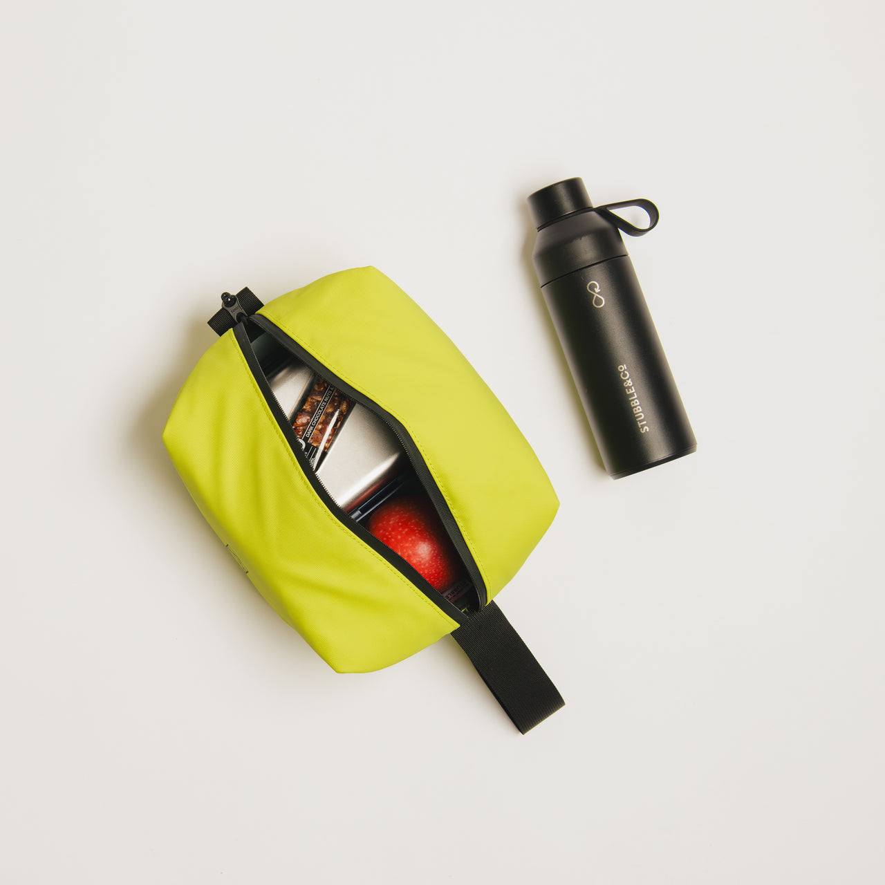 A Volt Cooler Bag with a bottle for water outside and a packed lunch inside