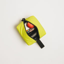 A Volt Cooler Bag with a bottle for water and a packed lunch inside