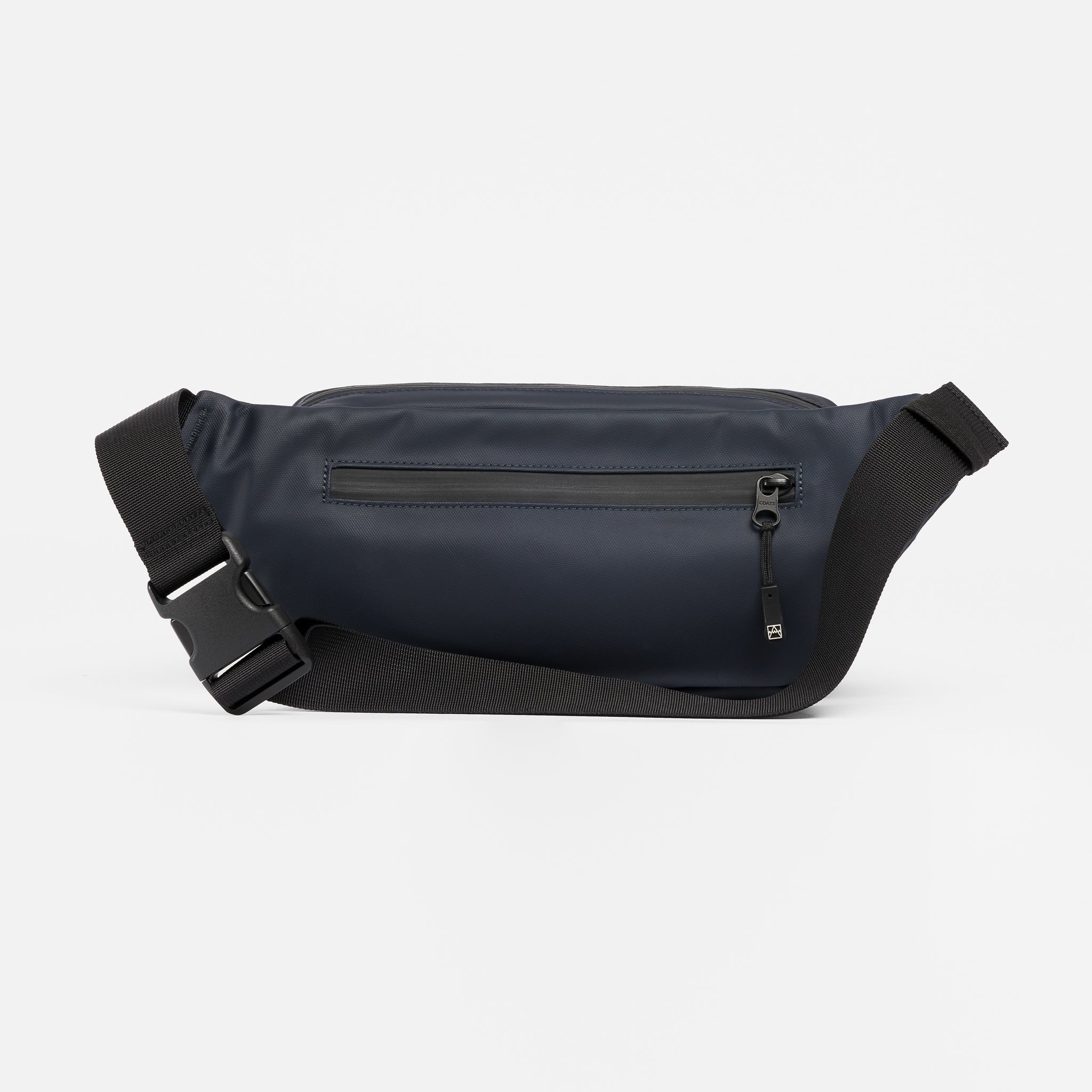A studio shot of the Midnight Blue Crossbody bag including the external zip 