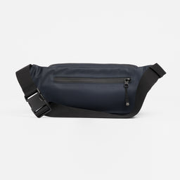 A studio shot of the Midnight Blue Crossbody bag including the external zip 