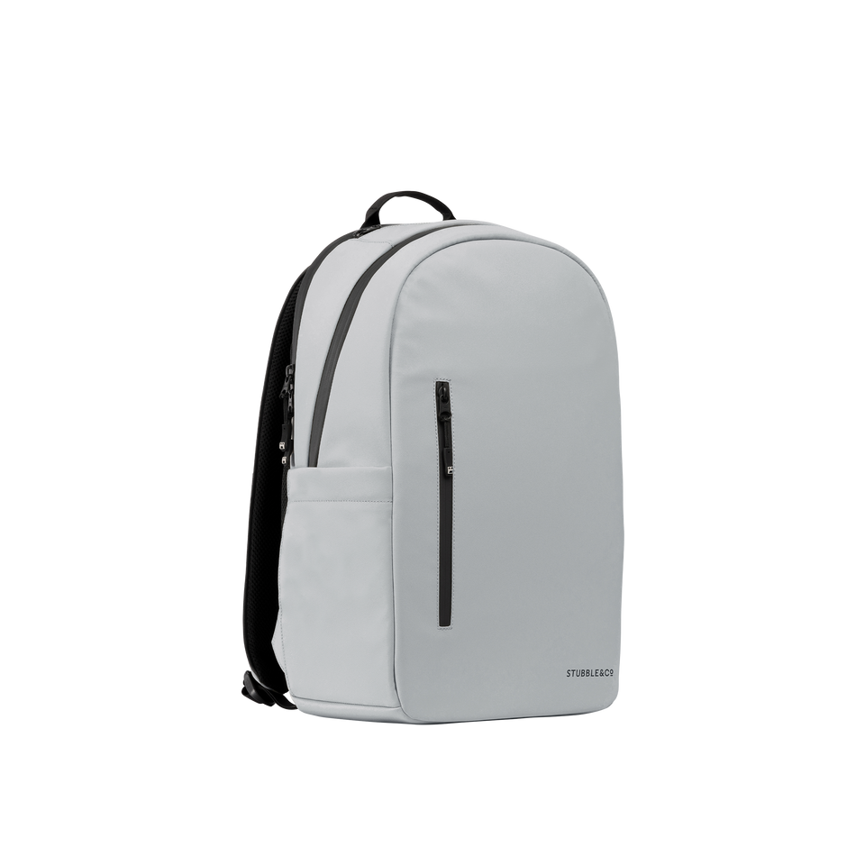 A studio shot of the front and side of an everyday backpack 15l as cut out transparent PNG- concrete