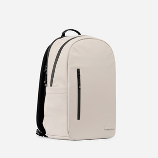 A studio shot of the front and side of the Everyday Backpack 20L in Sand