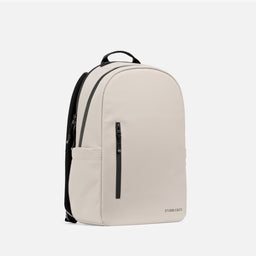 A studio shot of the front at an angle of the Everyday Backpack 15L in Sand